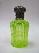 Victorian cut uranium / vaseline glass perfume bottle, with hinged repousse decorated cap and