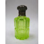 Victorian cut uranium / vaseline glass perfume bottle, with hinged repousse decorated cap and