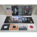 Parcel of twelve Beatles related vinyl records and singles