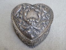Victorian hallmarked silver heart form storage box with cover, with repousse decoration