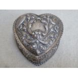 Victorian hallmarked silver heart form storage box with cover, with repousse decoration