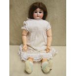 Early 20th century Armand Marseille bisque headed and voiced doll, impressed 3200, A M 2/0 DEP, with