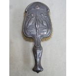 Hallmarked silver art nouveau dressing brush by Walker & Hall, repousse decorated with kingfishers