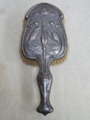 Hallmarked silver art nouveau dressing brush by Walker & Hall, repousse decorated with kingfishers
