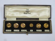 Cased 9ct gold 6 piece 'The OP stud set' collar studs