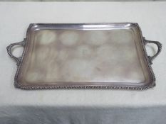 Large hallmarked silver two handled serving tray, by Sibray, Hall & Co Ltd (Charles Clement