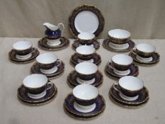 Parcel of Coalport Hazelton cobalt blue teaware, gilded with grape and vine decoration. Approx. 36