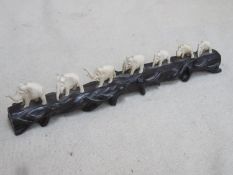 Heavily carved antique ivory graduated elephant train