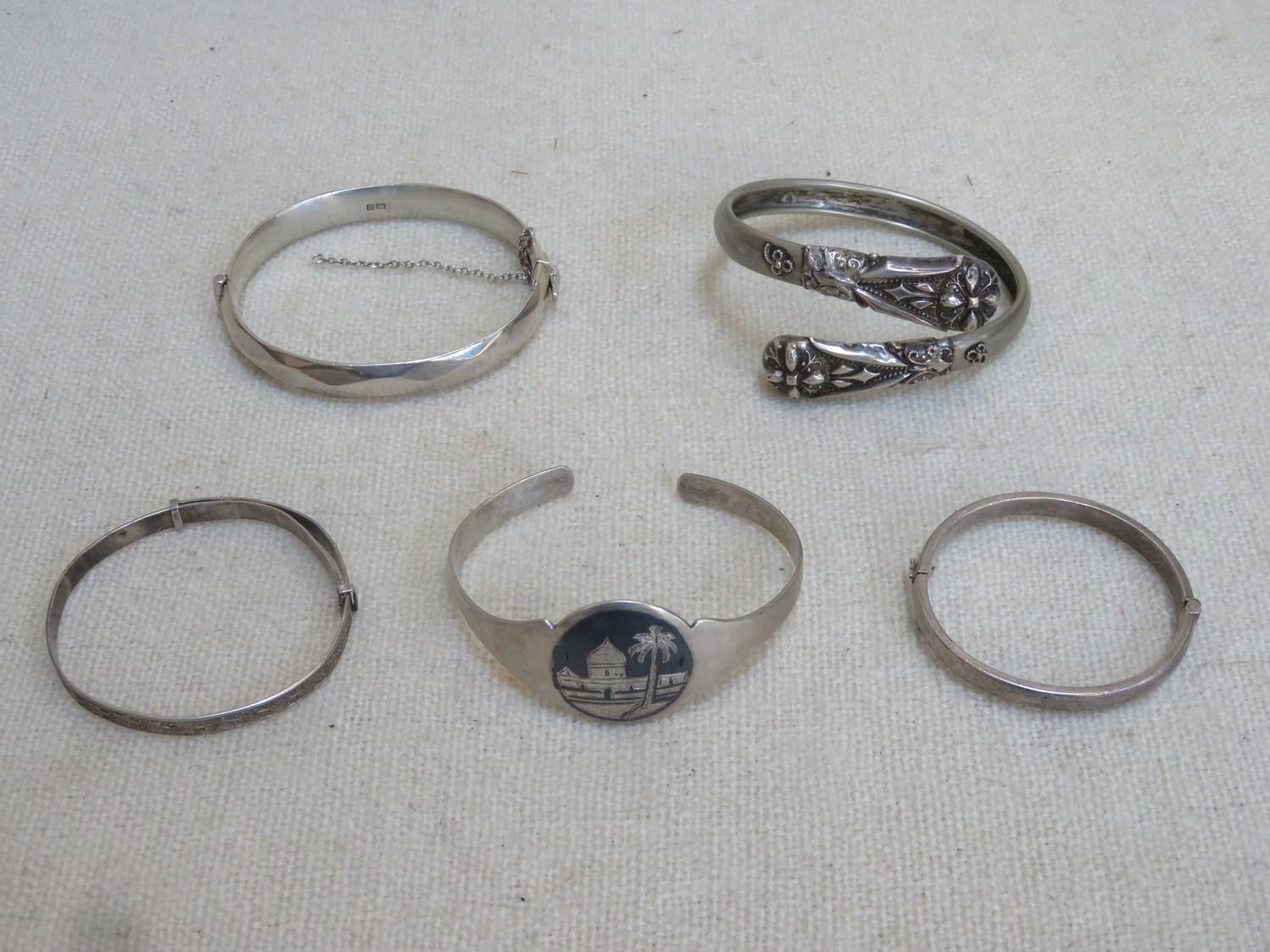 Parcel of various Silver Bangles, various styles. Weight Approx. 89G