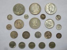 1887 one dollar coin plus various other American and Canadian coinage, various dates