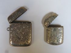 Two hallmarked silver vesta cases with hinged covers, both Birmingham assay marks. Total weight 41g