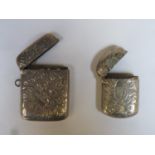 Two hallmarked silver vesta cases with hinged covers, both Birmingham assay marks. Total weight 41g