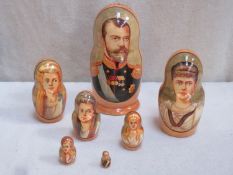 Set of seven vintage hand painted Russian nesting dolls, depicting Tsar Nicholas II and his