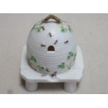 First period Belleek grass pattern honey pot and cover in the form of a wicker bee skep, raised on