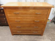 Modern solid light oak four drawer bedroom chest. Approx. 99cms long x 43cms deep x 89cms high