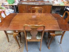 Victorian style mahogany draw leaf dining table, four chairs & serpentine fronted sideboard