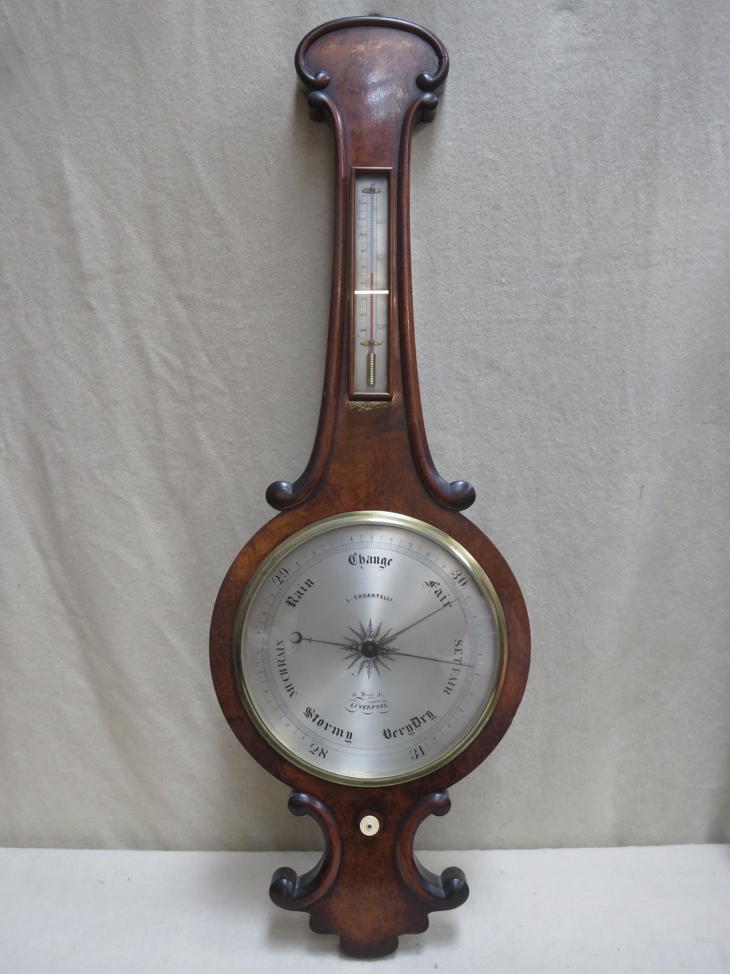 Victorian burr walnut banjo / wheel barometer with star centre silver coloured register and