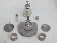 Mixed lot of silver items including glass match striker on plated stand, napkin rings, Chinese