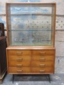 MID 20th CENTURY CHEST OF EIGHT DRAWERS WITH GLAZED BOOKCASE TOP SECTION