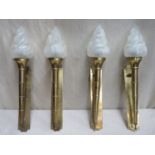 Set of twelve early 20th century brass wall sconce light fittings, all with frosted glass shades.