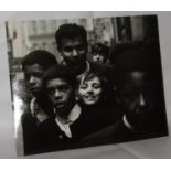 Black and white photograph of children in Liverpool by Astrid Kirchherr signed on reverse. size