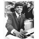 Two early promotional photographs of Apple recording artist Billy Preston