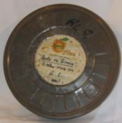 An original film cannister which formerly contained Born To Boogie movie with Apple Films label