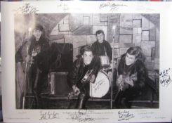 Poster featuring a drawing of the Beatles in Cavern Club signed by George Martin, Allan Williams,