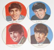 The Beatles set of four Bottle Toppers 1964