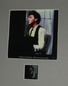 Colour slide of Paul McCartney mounted with photograph of slide