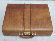 Vintage tan / brown leather briefcase with nicely fitted interior, carry handle, and brass