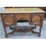 Early 20th century oak leather topped writing desk, fitted with three drawers, on stretchered