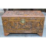 Heavily carved early to mid 20th century camphorwood storage chest, decorated with oriental
