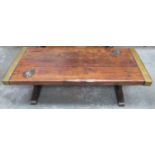Interesting rustic style brass bound wooden coffee table, formerly a ships hatch door. Approx.