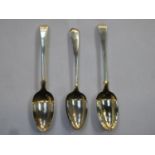 Pair of George III hallmarked silver spoons, London assay dated 1762, makers marks worn, possibly by