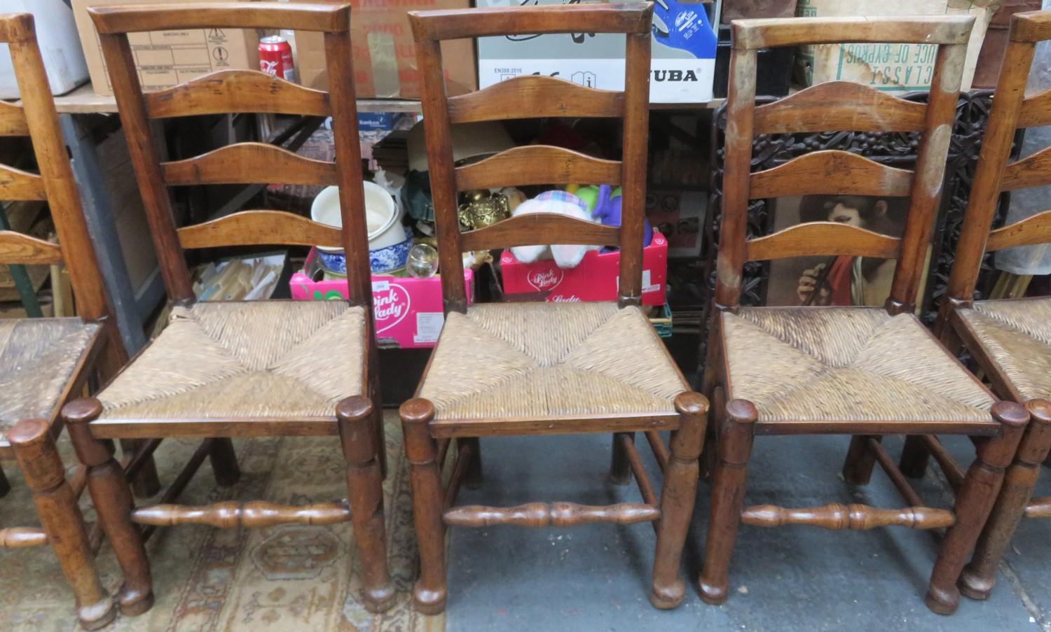 Set of Five similar 19th century rush seated country style ladder back chairs, on stretchered