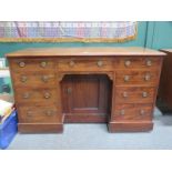 VICTORIAN MAHOGANY NINE DRAWER KNEEHOLE WRITING DESK FITTED WITH SINGLE CUPBOARD DOOR