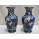 Pair of 20th century Japanese cloisonne vases, with floral and gilded decoration throughout .