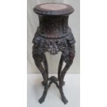 19th century heavily carved piercework decorated oriental plant stand, with marble insert to top, on