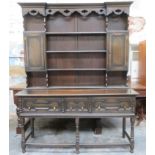 20th century oak welsh style three drawer kitchen dresser with plate rack above. Approx. 195cm H x