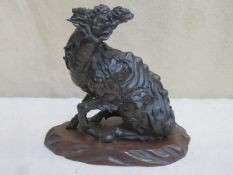 19th century bronze figure of a seated mythical creature "PIXIU", with relief decoration, on