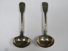 Pair of George IV hallmarked silver sauce ladles by John & Henry Lias, London assay mark, dated 1821