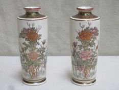 Pair of Japanese Satsuma ware ceramic vases, gilded and hand decorated with birds and floral scenes,