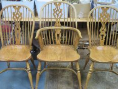 Set of Eight (seven plus one) 20th century Windsor style chairs on stretchered supports