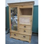 Early/Mid 20th century stripped pine combination wardrobe, fitted with open shelf, drawers and