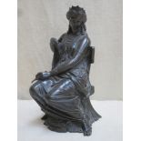 19th century bronze figure depicting a seated female royal on throne, possibly European. Approx.