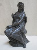 19th century bronze figure depicting a seated female royal on throne, possibly European. Approx.