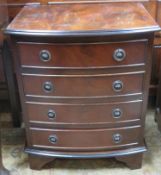 Mid 20th century small bow fronted mahogany chest of four drawers. Approx. 59cm H x 39cm W x 34cm D