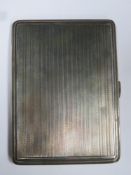Hallmarked silver machine turned cigarette case, by Thomas William Lack, London assay mark, dated