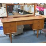 Vesper by Gimson and Slater mid 20th century teak dressing table. Approx. 119cm H x 103cm W x 46cm D